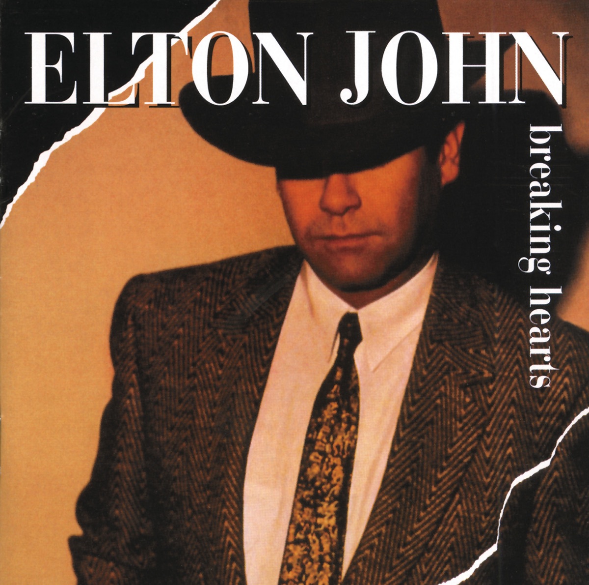 Обложка Elton John — Breaking Hearts