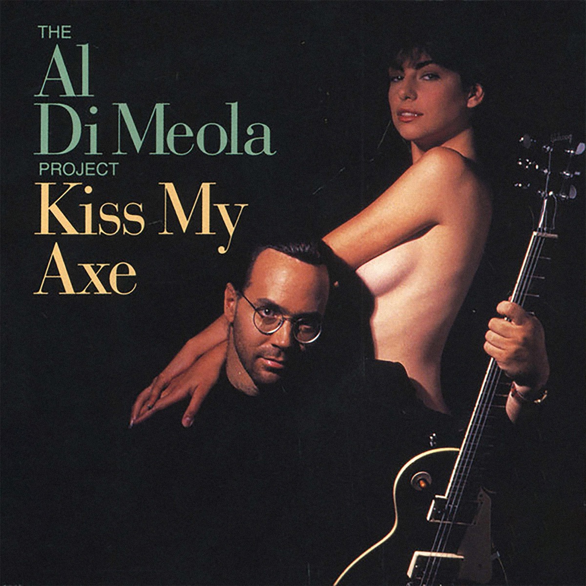 Обложка Al Di Meola — Kiss My Axe
