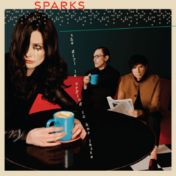 Обложка Sparks — THE GIRL IS CRYING IN HER LATTE